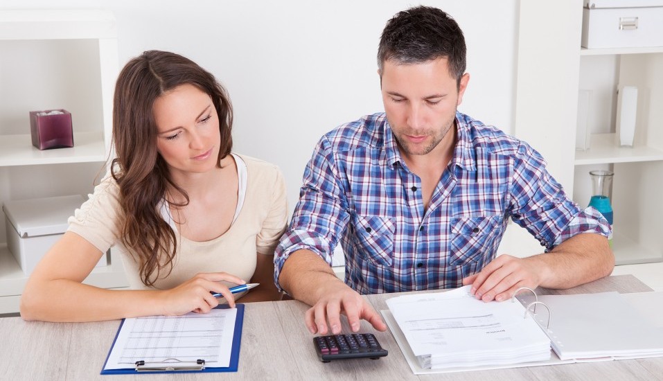 Couple Calculating Bills